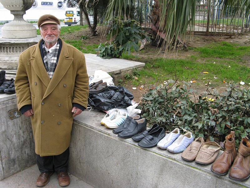 Turkish man selling shoes on the street